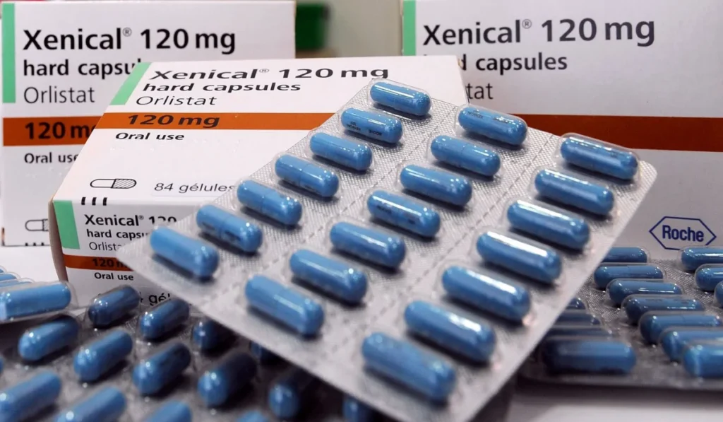 A closeup of Xenical capsules.